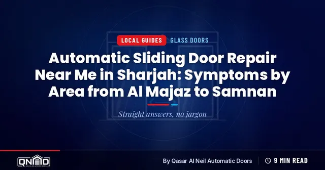 Automatic glass sliding door at a Sharjah shop entrance with the sensor above the frame and a hand wiping the floor track